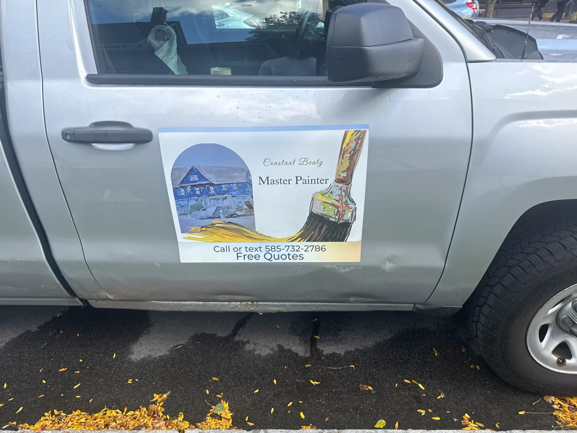 Constant Beaty Master Painter work truck with logo and free quotes sign on the door
